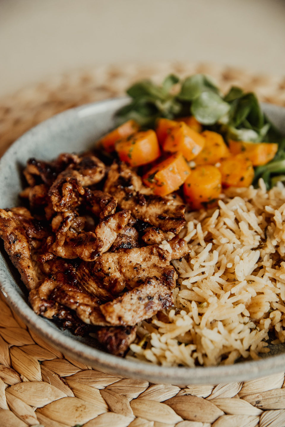 A meal of chicken, rice and vegetables